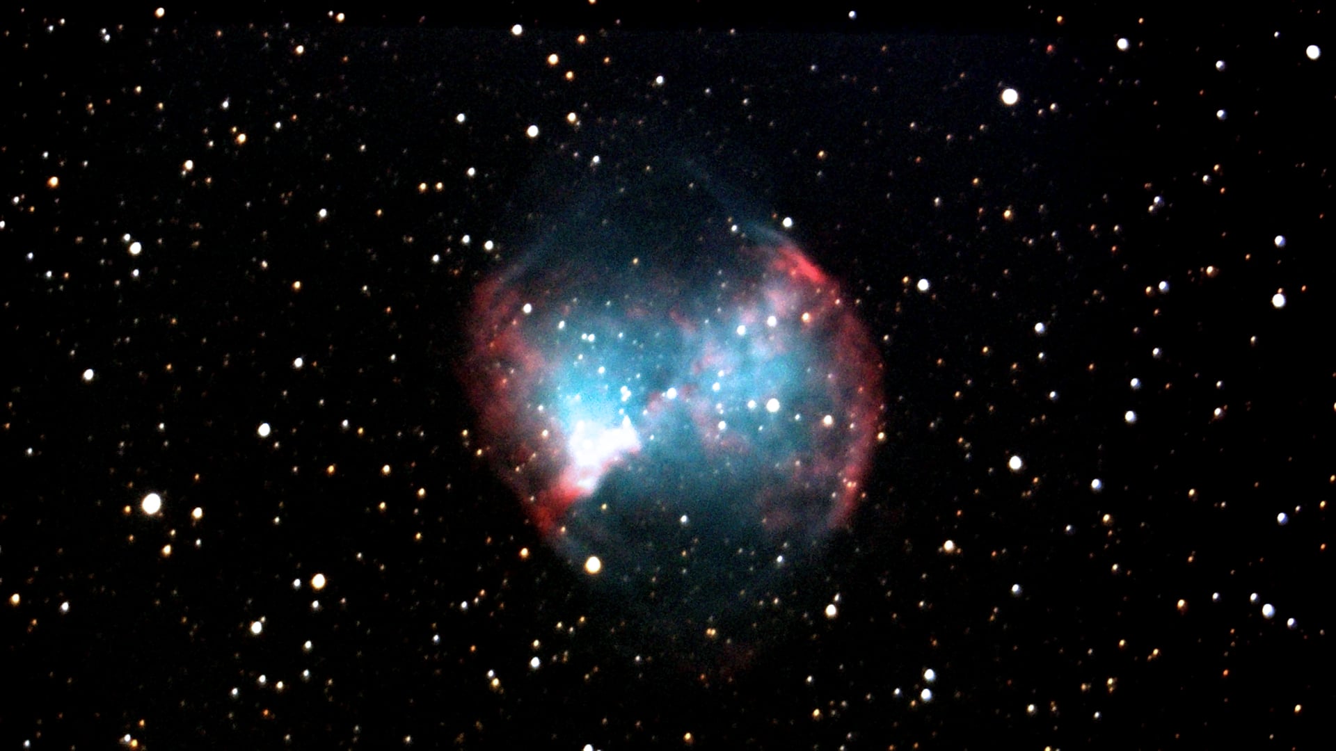 Nebulosa Manubrio M27: resa blu-verde ben definita, studio di dettaglio e saturazione controllata